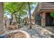 Charming backyard featuring lush greenery and custom garden design at 2825 Burnham Ave, Las Vegas, NV 89169
