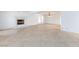 Bright living room with a fireplace, and light tile floors, creating a spacious and welcoming atmosphere at 2825 Burnham Ave, Las Vegas, NV 89169