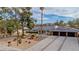 Stunning single-story home with an attached garage and a meticulously landscaped front yard at 3189 Montecito Dr, Las Vegas, NV 89120