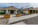 Charming home exterior with stone accents, desert landscaping, and a paved entryway at 3189 Montecito Dr, Las Vegas, NV 89120