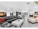 Spacious living room featuring modern furniture, sleek floors, and abundant natural light at 3189 Montecito Dr, Las Vegas, NV 89120