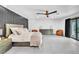Bright bedroom with large bed, elegant furnishings, and modern accents at 3189 Montecito Dr, Las Vegas, NV 89120