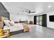 Large main bedroom features a ceiling fan, access to the backyard, and modern furnishings at 3189 Montecito Dr, Las Vegas, NV 89120