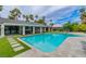 Backyard pool with lush landscaping offering a private and relaxing outdoor space at 3189 Montecito Dr, Las Vegas, NV 89120