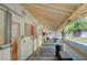 Exterior view of a horse barn with covered stalls at 3189 Montecito Dr, Las Vegas, NV 89120