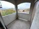 Outdoor balcony area with views of neighborhood buildings and mountain in the distance at 3354 Indian Shadow St # 203, Las Vegas, NV 89129