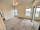 The bedroom has natural light and mirrored closet doors, creating a spacious retreat at 3354 Indian Shadow St # 203, Las Vegas, NV 89129