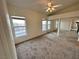 Bright bedroom with windows and mirrored closet doors enhances the spacious feel at 3354 Indian Shadow St # 203, Las Vegas, NV 89129
