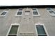 The building exterior is painted beige and provides easy to read unit number signage at 3354 Indian Shadow St # 203, Las Vegas, NV 89129