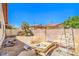 Backyard with space for a garden, an outdoor dining area, and a relaxing lounge area at 3434 Toquima Cir, Las Vegas, NV 89120