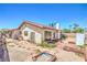 Backyard featuring brick accents, providing a canvas for creating an outdoor retreat at 3434 Toquima Cir, Las Vegas, NV 89120