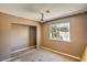 Bedroom with a window, closet, and carpet at 3434 Toquima Cir, Las Vegas, NV 89120