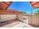 Cozy outdoor patio with brick flooring, partially enclosed by a brick wall at 3434 Toquima Cir, Las Vegas, NV 89120