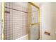 Shower with glass doors and tile walls at 3434 Toquima Cir, Las Vegas, NV 89120