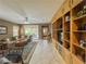 Spacious living room with a built-in entertainment center and access to the patio at 3476 Ridge Meadow St, Las Vegas, NV 89135