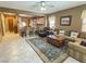 Open-concept living area with a breakfast bar connected to the kitchen and comfortable seating at 3476 Ridge Meadow St, Las Vegas, NV 89135
