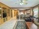 Spacious living room with bar seating looking into the kitchen and built-in entertainment center at 3476 Ridge Meadow St, Las Vegas, NV 89135