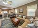 Relaxing living room space featuring comfortable seating and a kitchen view at 3476 Ridge Meadow St, Las Vegas, NV 89135