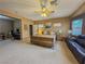 Bright main bedroom offering a workstation, seating area and ample space at 3476 Ridge Meadow St, Las Vegas, NV 89135