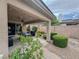 Inviting covered patio with a dining table, seating, and a grill, perfect for outdoor entertaining at 3476 Ridge Meadow St, Las Vegas, NV 89135