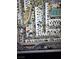 An aerial view of a community with townhomes, streets, and a red pin marking a specific location within the neighborhood at 3660 Haverhill St, Las Vegas, NV 89121