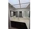 Bathroom featuring a countertop and multiple mirrors, offering lots of space and light at 3660 Haverhill St, Las Vegas, NV 89121