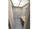 Bright bathroom with tile flooring, toilet, towel rack, and a sink with a mirror at 3660 Haverhill St, Las Vegas, NV 89121