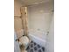 Bathroom equipped with a tub, toilet, and towel rack, ensuring comfort and functionality at 3660 Haverhill St, Las Vegas, NV 89121