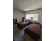 Bedroom with twin beds, a window with blinds, and a comfortable space at 3660 Haverhill St, Las Vegas, NV 89121