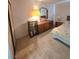 A bedroom featuring a large bed with a nightstand, dresser, mirror, and closet at 3660 Haverhill St, Las Vegas, NV 89121
