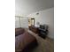 Comfortable bedroom with twin beds, a dresser, a mirror, and a closet with sliding doors at 3660 Haverhill St, Las Vegas, NV 89121