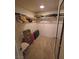 Organized closet with hanging clothes, luggage, and carpet for a streamlined storage solution at 3660 Haverhill St, Las Vegas, NV 89121