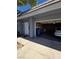 Exterior view of a two-car garage with an open door, offering convenient parking and storage at 3660 Haverhill St, Las Vegas, NV 89121