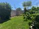 Well-maintained backyard featuring a grass lawn and mature trees for shade and privacy at 3805 White Castle St, Las Vegas, NV 89129