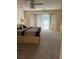 Large bedroom featuring a sliding glass door and neutral-colored walls at 3805 White Castle St, Las Vegas, NV 89129