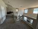 The spacious loft features a wall clock and modern railing at 3805 White Castle St, Las Vegas, NV 89129