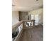 The open loft area has neutral decor with multiple doors at 3805 White Castle St, Las Vegas, NV 89129