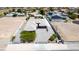 Aerial view of a large home with a long driveway, desert landscaping, and a spacious lot at 4070 N Tee Pee Ln, Las Vegas, NV 89129