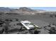 High angle view showcasing large lot with modern house, pool, and RV parking at 4070 N Tee Pee Ln, Las Vegas, NV 89129