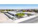 Aerial view of home showcasing privacy fencing, landscaping and mountain views in the distance at 4070 N Tee Pee Ln, Las Vegas, NV 89129