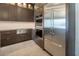 Stylish kitchen with stainless steel appliances, custom cabinetry, and modern fixtures for a chef-inspired experience at 4070 N Tee Pee Ln, Las Vegas, NV 89129