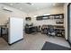 A bright office featuring built-in desks, cabinetry, and a mini-split system for climate control at 4070 N Tee Pee Ln, Las Vegas, NV 89129