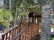 Inviting entrance featuring wooden stairs and a charming porch at 4125 Tyrol Way, Las Vegas, NV 89124