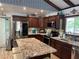 Spacious kitchen with stainless steel appliances, granite countertops, and ample cabinet space at 4125 Tyrol Way, Las Vegas, NV 89124