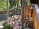Serene landscaping with a gentle waterfall feature, enhancing the natural beauty of the surroundings at 4125 Tyrol Way, Las Vegas, NV 89124