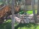 Peaceful pond surrounded by rocks and greenery, complemented by a well-maintained lawn at 4125 Tyrol Way, Las Vegas, NV 89124