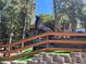 Outdoor area featuring an elk statue surrounded by mature trees at 4125 Tyrol Way, Las Vegas, NV 89124