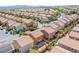 Expansive aerial view showcasing a well-maintained residential community with uniform rooftops and tree-lined streets at 433 Royal Bridge Dr, Las Vegas, NV 89178