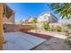 Spacious backyard featuring a concrete patio and rock garden at 433 Royal Bridge Dr, Las Vegas, NV 89178