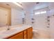 Bathroom featuring a vanity with a sink, a shower, and toilet at 433 Royal Bridge Dr, Las Vegas, NV 89178